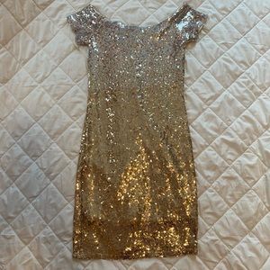 gold and silver sparkle off the shoulder dress